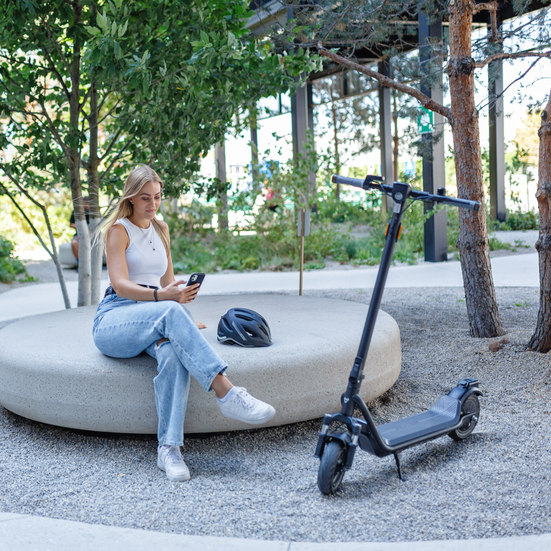 NIU - KQi100F Electric KickScooter lifestyle image female model